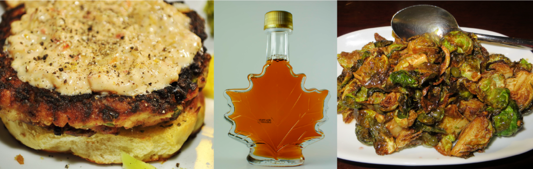 Left: crab cake with remoulade sauce. Middle: bottle of maple syrup. Right: charred Brussels sprouts.